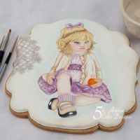 An age of Innocence Hand Painted Portrait Cookie